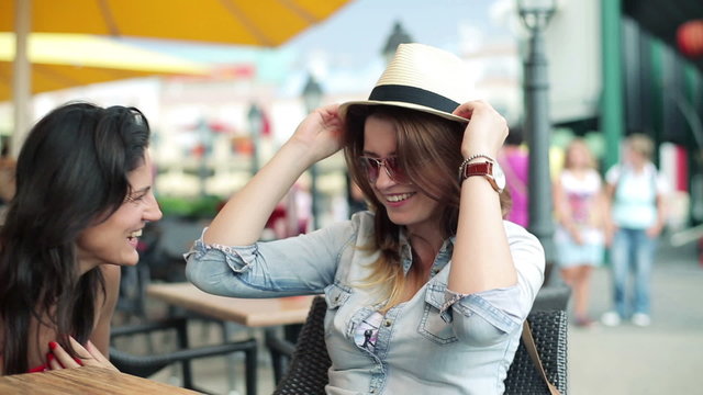 Female friends having fun in the restaurant, steadicam shot 