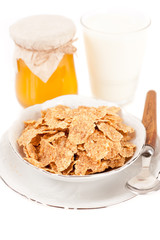 Muesli, honey and milk.