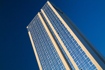 Skyscraper on a background of clear blue sky