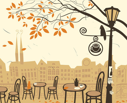 autumn landscape with a street cafe