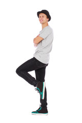 Young handsome guy with a modern clothes and a hat