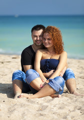 Fototapeta na wymiar Couple at the beach.