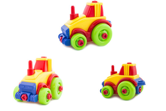 Set. Toy a plastic nursery, a tractor of bright shades.