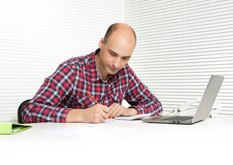 young man working at office