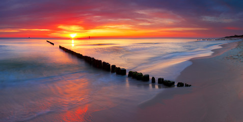 Baltic sea at beautiful sunrise in Poland beach.