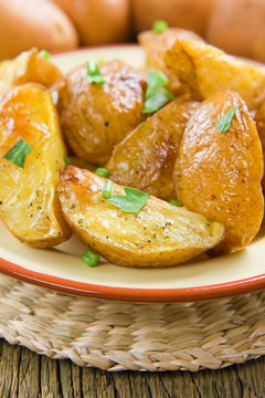 Rustic oven baked potatoes with parsley