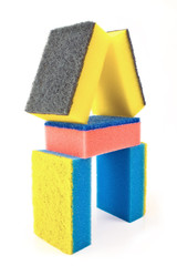 Colorful sponges in form of a house