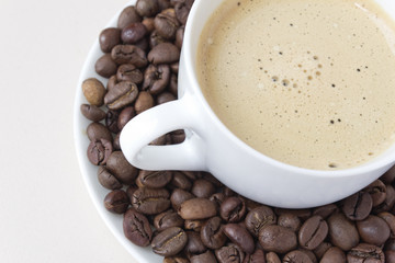 Coffee cup and coffee beans