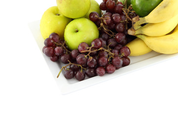 Fresh mixed fruit focus grape on white background.