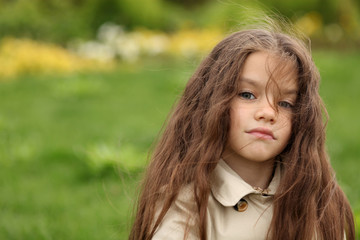 Fototapeta premium little girl in the autumn park