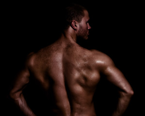 Rear view of young muscular man