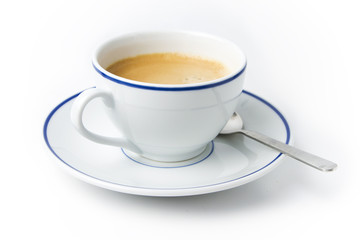 White cup of coffee on plate with spoon on white background