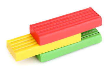 Children bright plasticine isolated on white