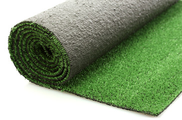 artificial rolled green grass, isolated on white