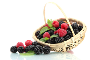 beautiful berries with leaves in basket isolated on white