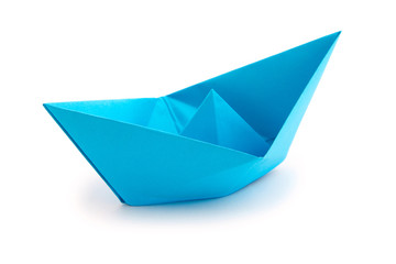 Origami paper boat on white background