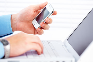 Business people calling by smartphone.