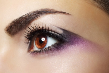 Obraz premium Purple Eye Makeup. Beautiful eye makeup close up