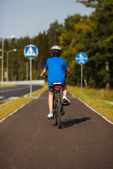 Obraz premium Boy biking