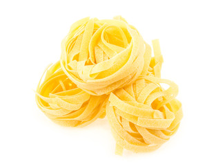 Italian pasta fettuccine nest isolated on white background