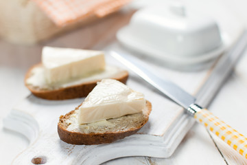 Slice of bread with cream cheese for breakfast