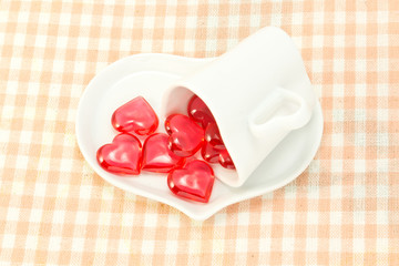 Red heart and heart shaped coffee cup