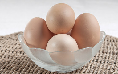 Eggs in glass bowl