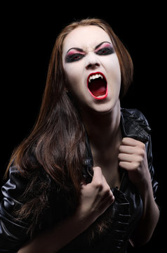 Young beautiful vampire woman