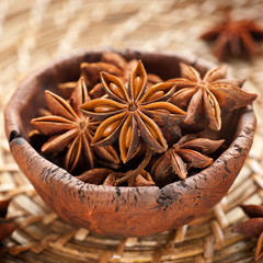 Spice star anise in a clay bowl