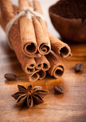 Cinnamon sticks and star anise on a wooden table