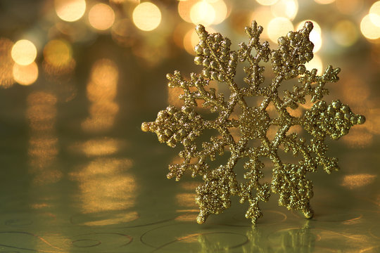 Gold Snowflake Holiday Background