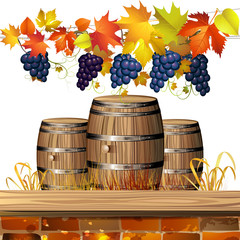 Wood barrel for wine with autumn leaves and grapes
