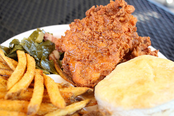 Fried chicken dinner with sides.