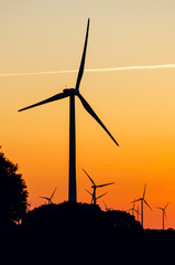 Obraz premium silhouette of wind generators