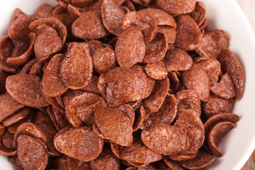 healthy bowl of chocolate cereal close up