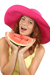 Smiling beautiful girl in beach hat with watermelon isolated
