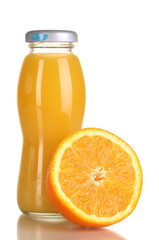 Delicious orange juice in a bottle and orange next to it