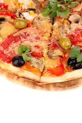 Tasty pizza with vegetables, chicken and olives close-up