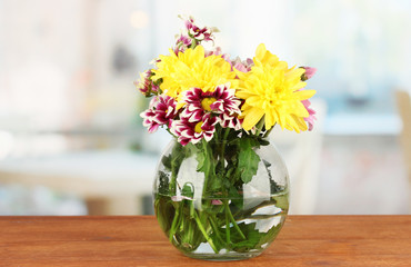 colorful bouquet of chrysanthemums in a glass vase