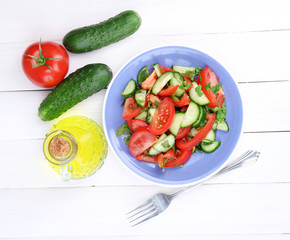 Fresh salad with tomatoes and cucumbers
