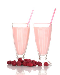 Raspberry milk shakes isolated on white