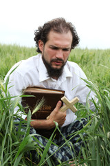 Man praying for good wheat year