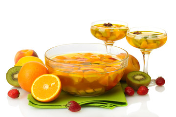punch in bowl and glasses with fruits,