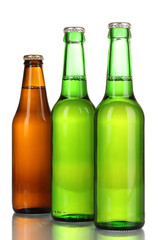 three bottles of beer isolated on white