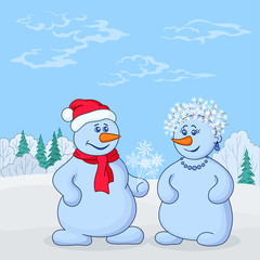 Snowmans in winter forest