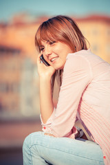 Beautiful Young Woman Talking on Mobile Phone