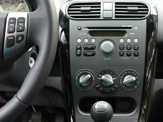 Car radio ... with steering wheel audio controls.