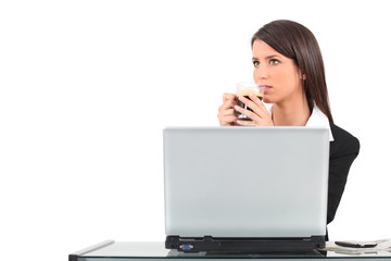 Woman sat at laptop