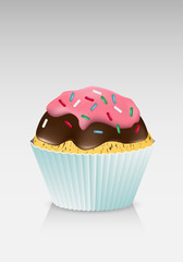 Cupcake with chocolate and candy on top