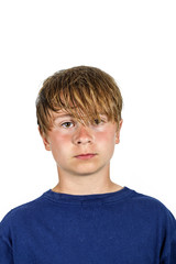 Obraz premium sad boy in studio with wet hair